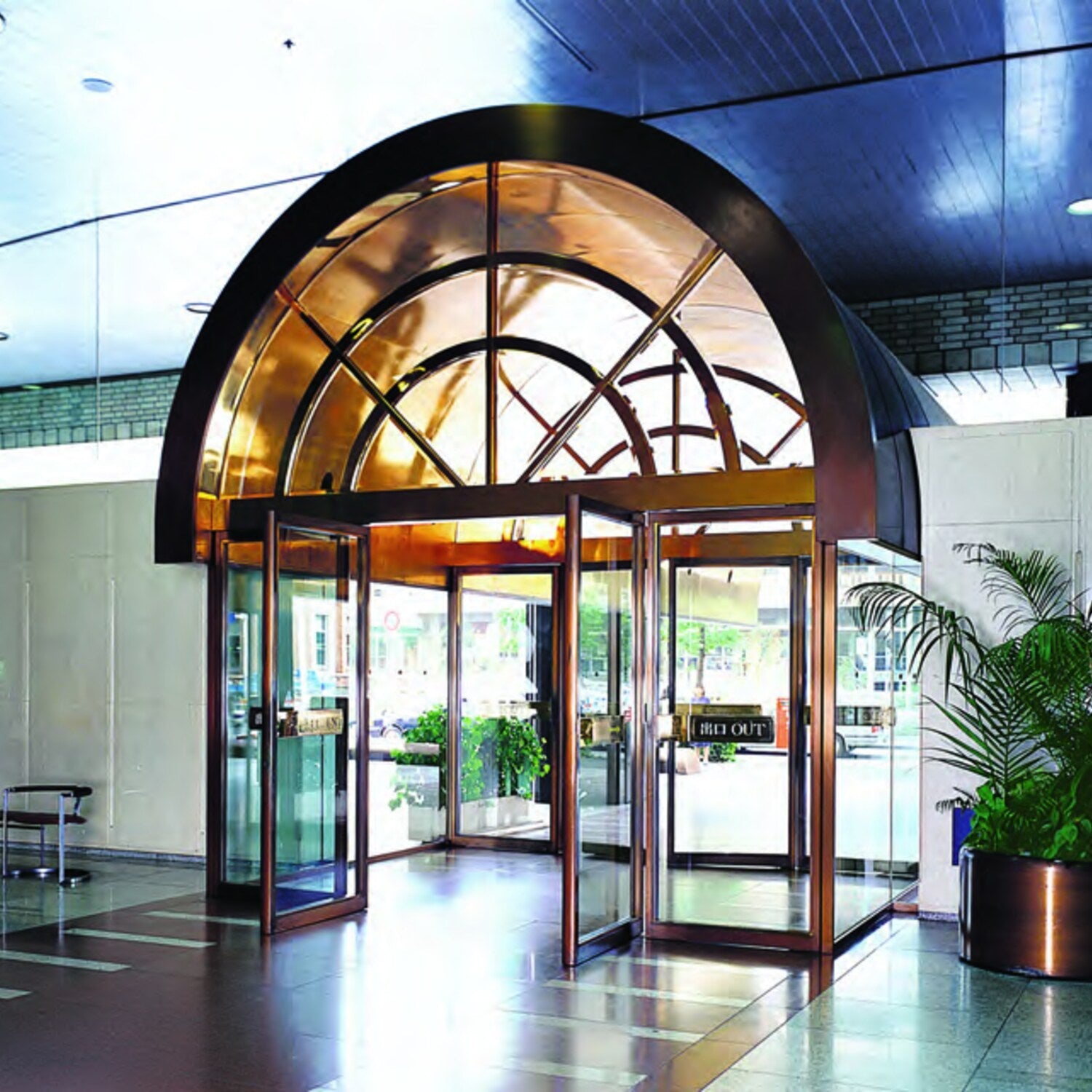 NABCO automatic swing doors under an arched building entrance